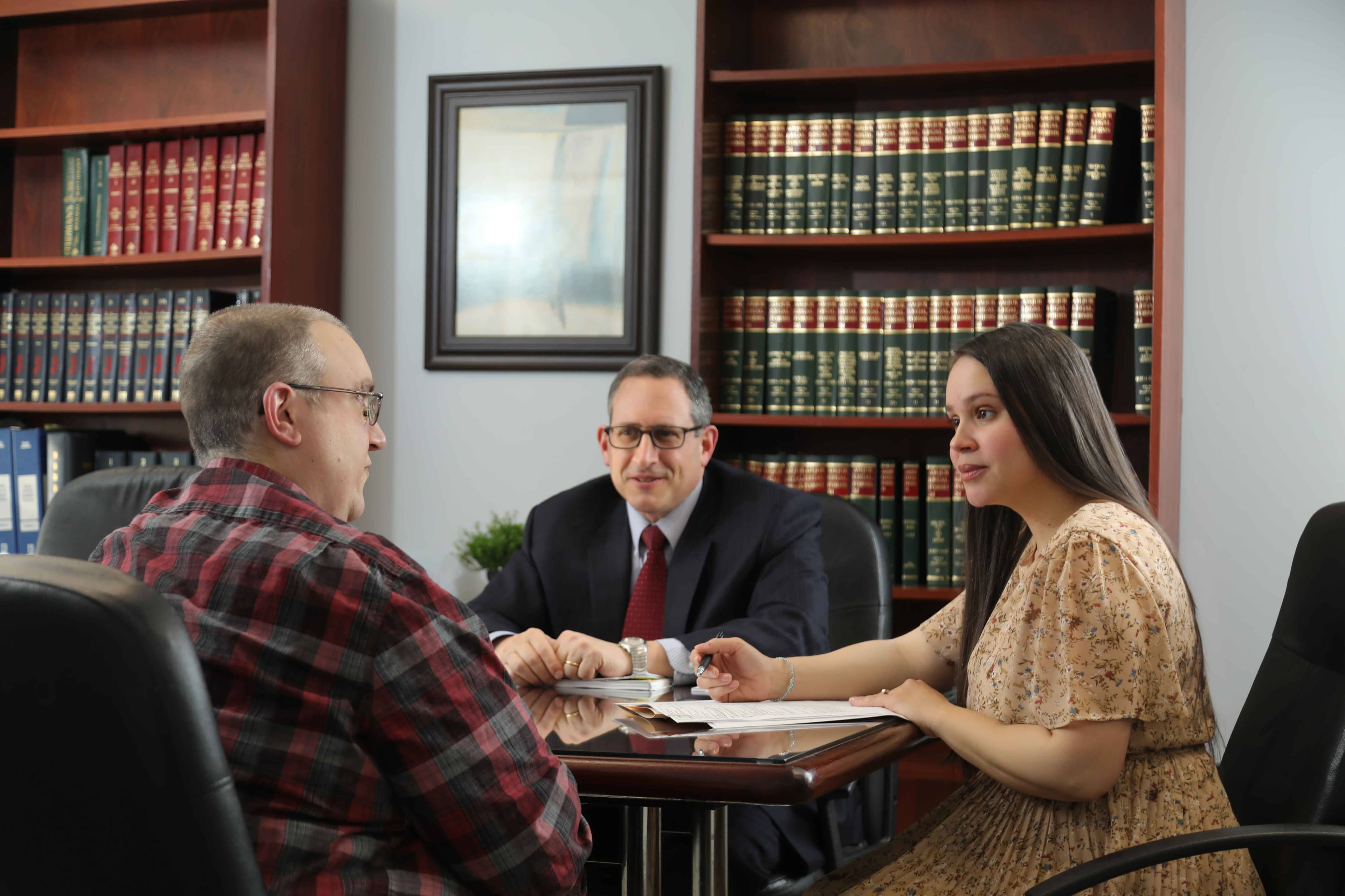 Experienced New Jersey workers compensation attorney reviewing a client case